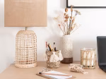 Lampe en rotin tressé et abat-jour en lin beige