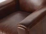 Fauteuil club vintage en cuir vieilli